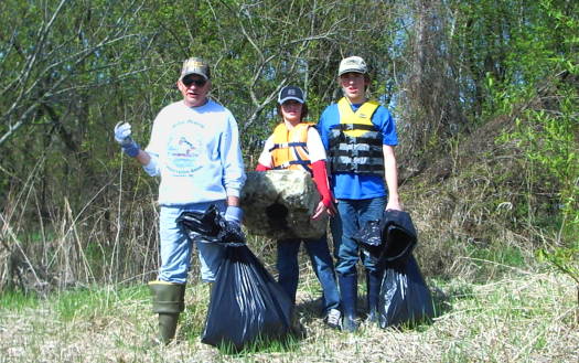  Mike with kids and garbage from cleanup